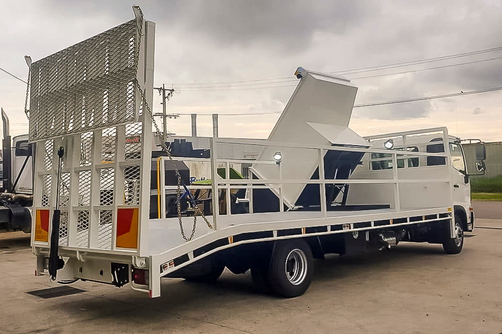 Custom beavertail tray for council street sweepers with tipper and bifold ramp. Metro Truck Body Builders, the trusted name in truck bodies in Melbourne Victoria since 1989.