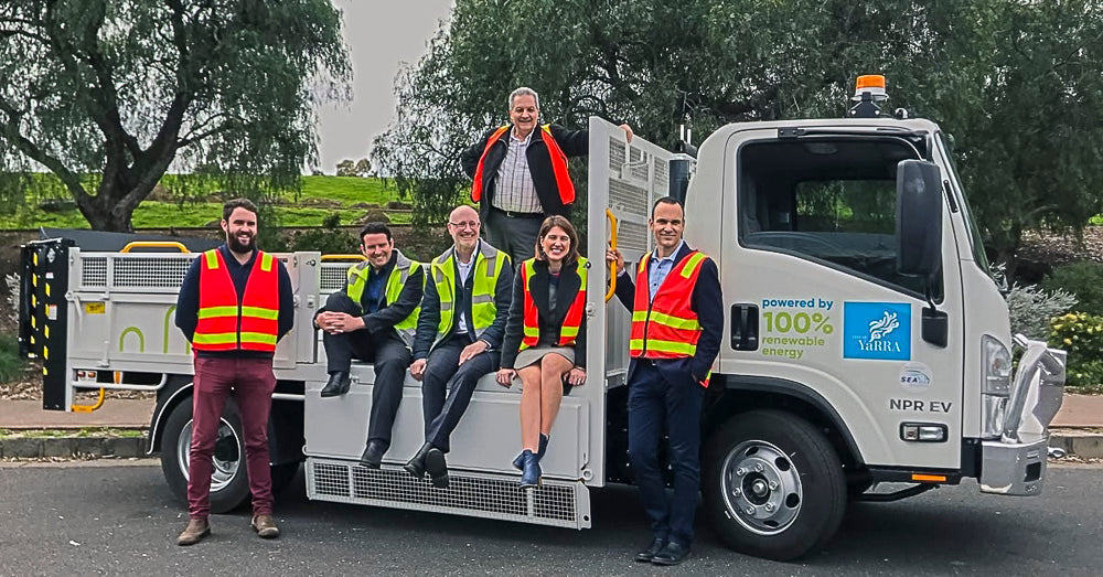 City of Yarra electric tipper truck with drop sides and mesh hungry boards, built by Metro Truck Body Builders Melbourne.