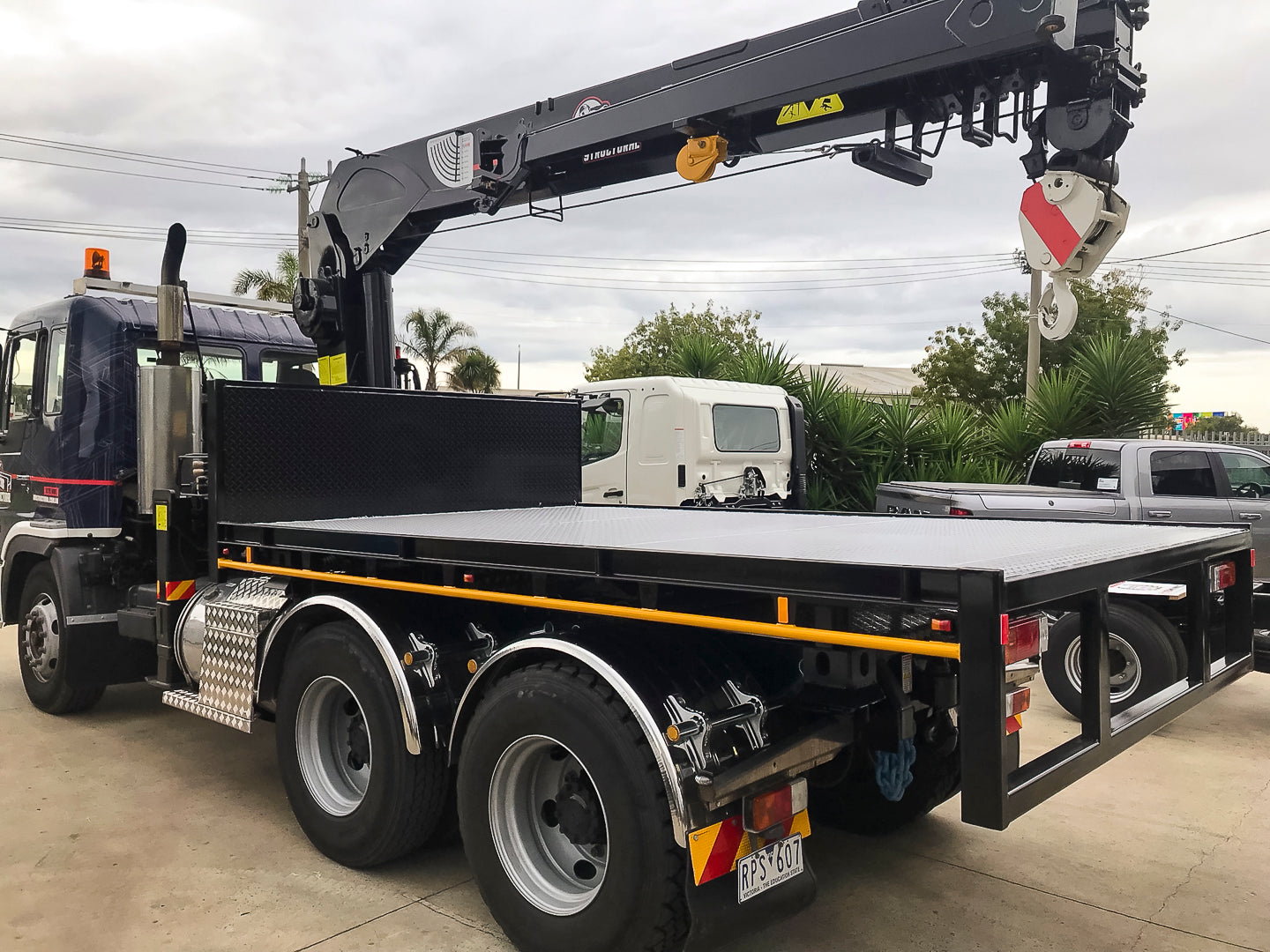 Custom removable prime mover tray with fitted crane, built by Metro Truck Body Builders Melbourne.