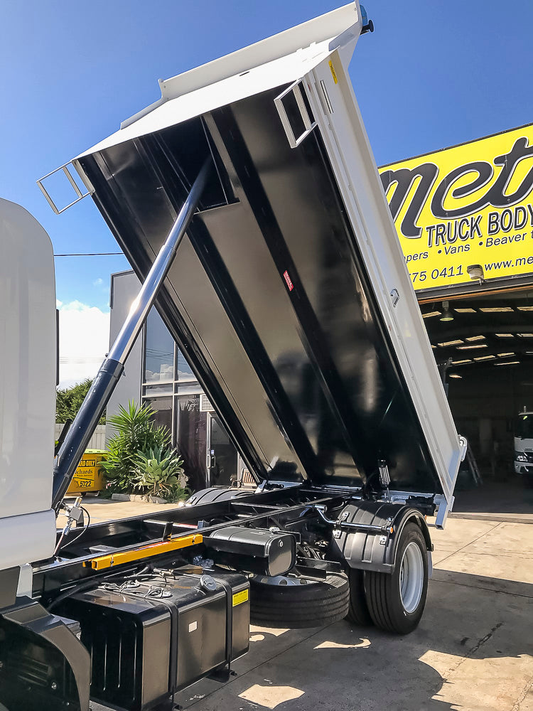Custom tipper truck body and hydraulic tipping system built by Metro Truck Body Builders, custom truck body builders and manufacturers in Seaford, Melbourne, Victoria.